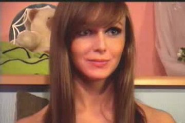 Chick in front of a webcam shows tits