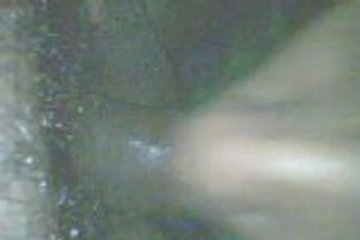 A blow job done in the semi-darkness