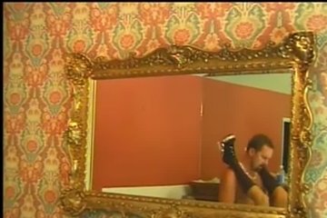 A man fucks a busty girlfriend on the table