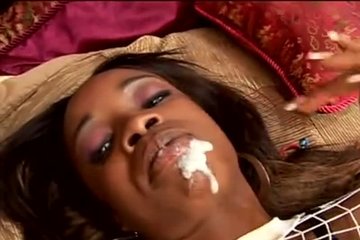 A black man passionately enters a dark-skinned girlfriend