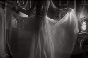 Brunette with big tits plays with sex toys