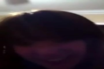 Sexy brunette passionately sucks a guy