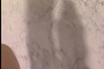 Sucking a man's dick in the shower