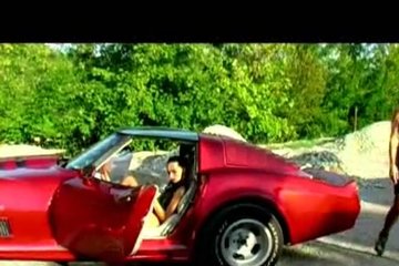 Sexy girlfriends have fun on the hood of a car