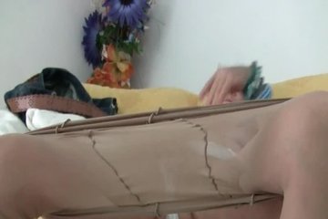 The old woman undresses and shows a weakness for masturbation