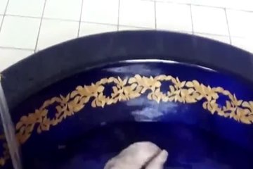 Rubber doll in the bathtub