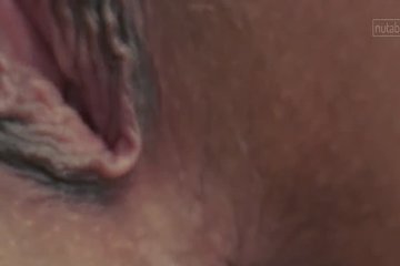 Brunette fingers own pussy and licks own juice