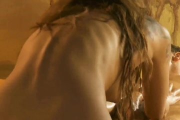 Slender brown-haired woman does erotic massage