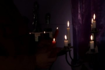 Romantic candlelit sex in the bedroom