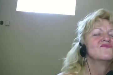 Granny enjoying music while gyming
