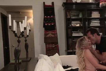 A man is satisfied with sofa sex with a beauty