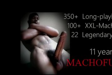 A bald man sat astride a black penis of a Afro-American