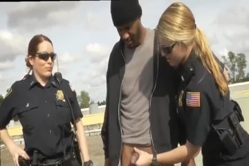 A Afro-American instead of a bribe gives a big black dick to a police blonde to suck