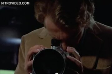 Guys are spying on a chick