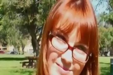 Redhead sucks a big phallus