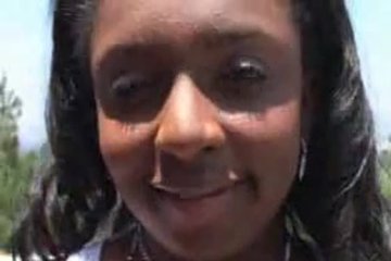 A black woman with big milks jerks off a dick